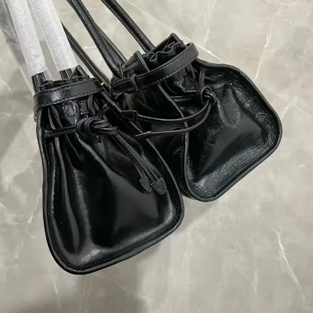 Prada Enamel Triangle Bag: Authentic vs. High-Quality Replica Comparison